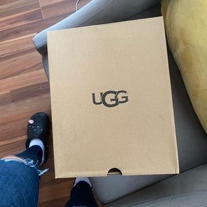 All black with grey fur Pair of UGG.